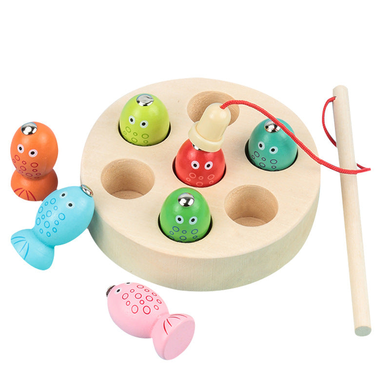 Wooden fishing toy with colorful fish and pegs on a white background