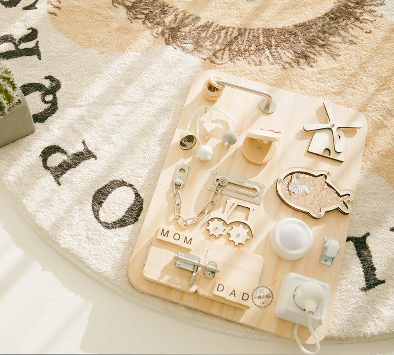 Wooden puzzle with decorative items on a textured surface