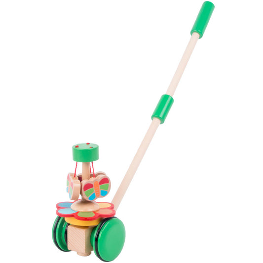 Colorful wooden toy with wheels and a handle on a white background