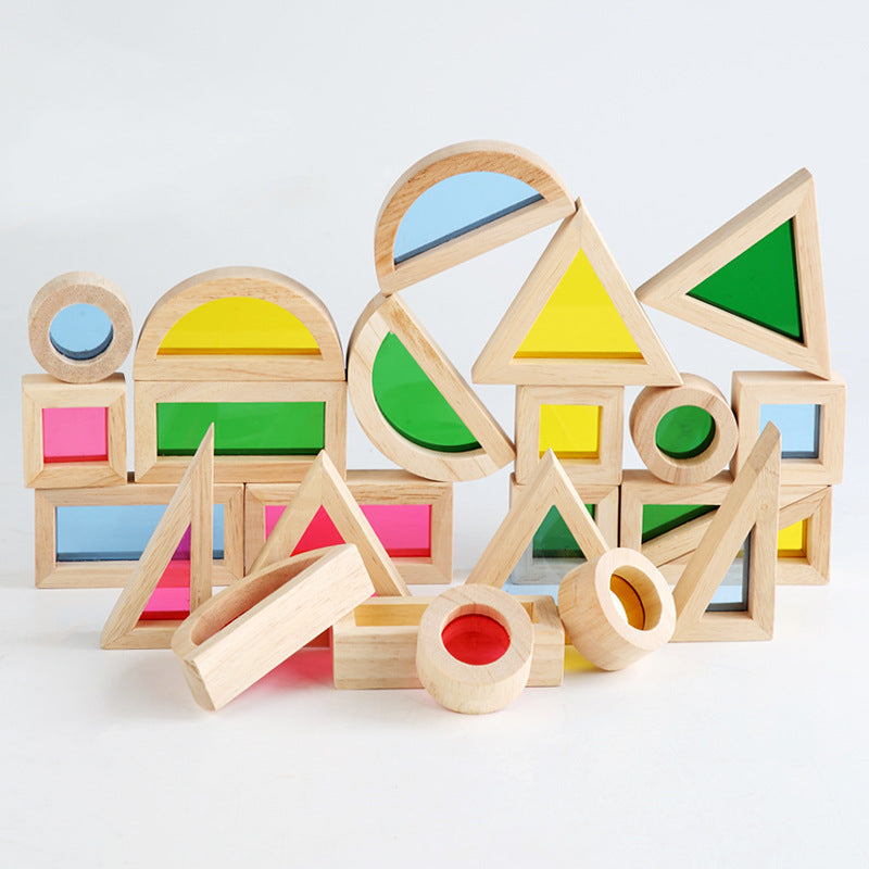 Colorful wooden geometric blocks on a white background