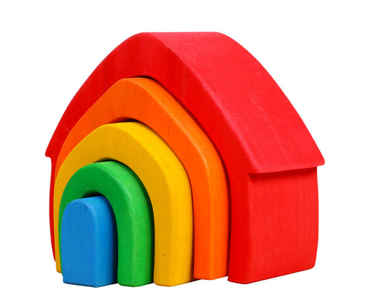 Set of colorful wooden blocks stacked in a rainbow pattern on a white background.
