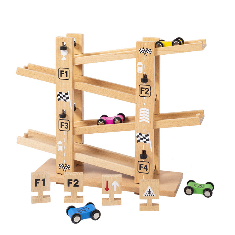 Wooden toy race track with cars on a white background