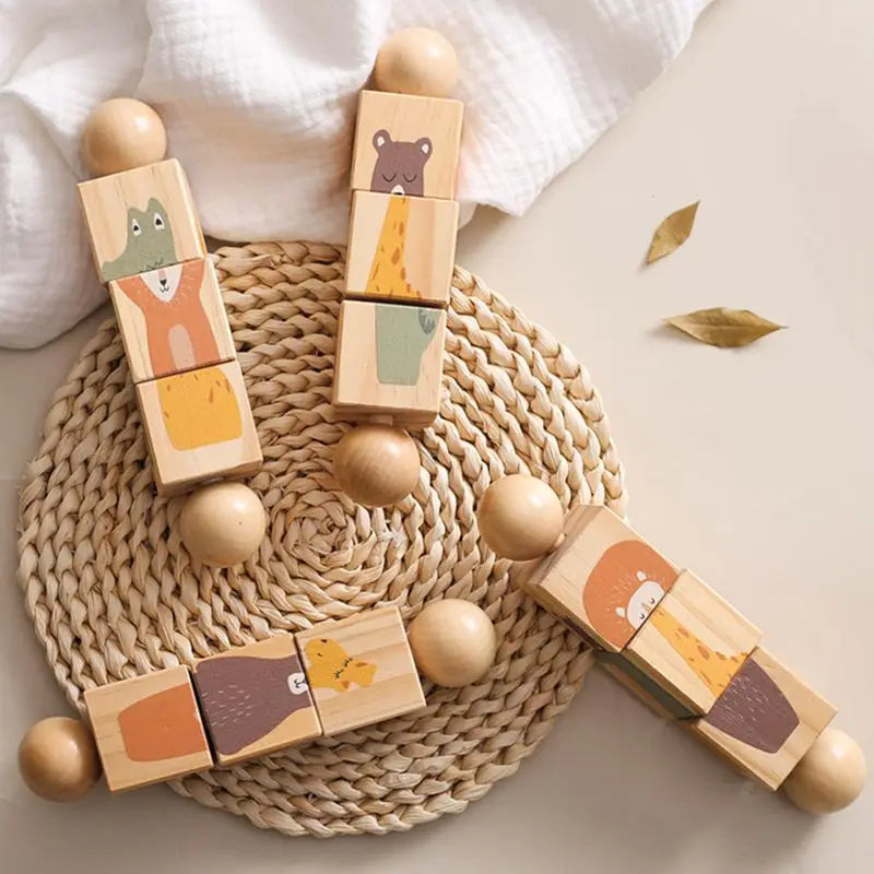 Wooden blocks with animal designs on a woven mat