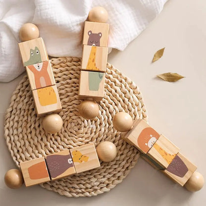 Wooden blocks with animal designs on a woven mat