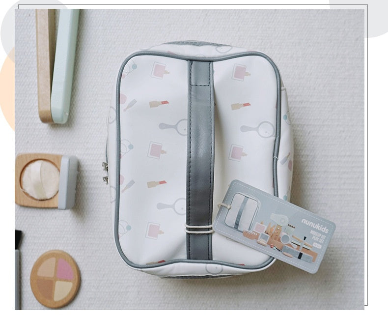 Foldable travel bag with a pattern on a light surface