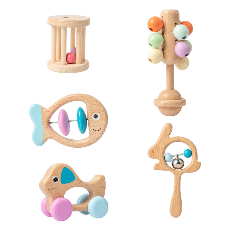 Set of colorful wooden baby toys on a white background