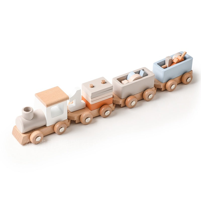 Wooden toy train set on a white background