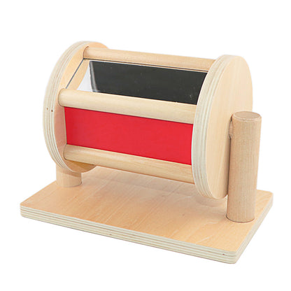 Wooden toy with a red interior and black top on a white background