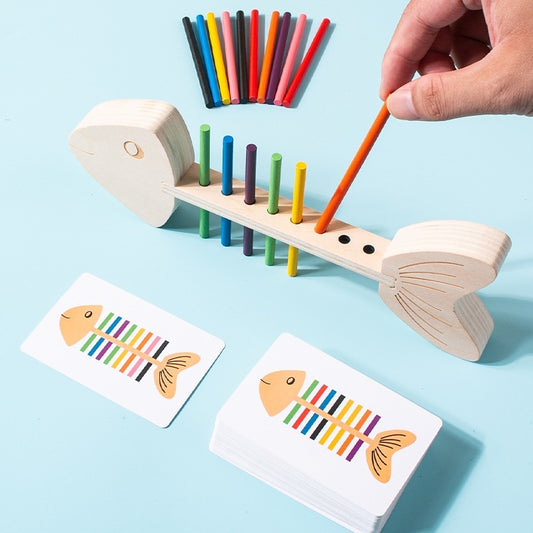 Wooden fish-shaped colour matching toy with wooden sticks

