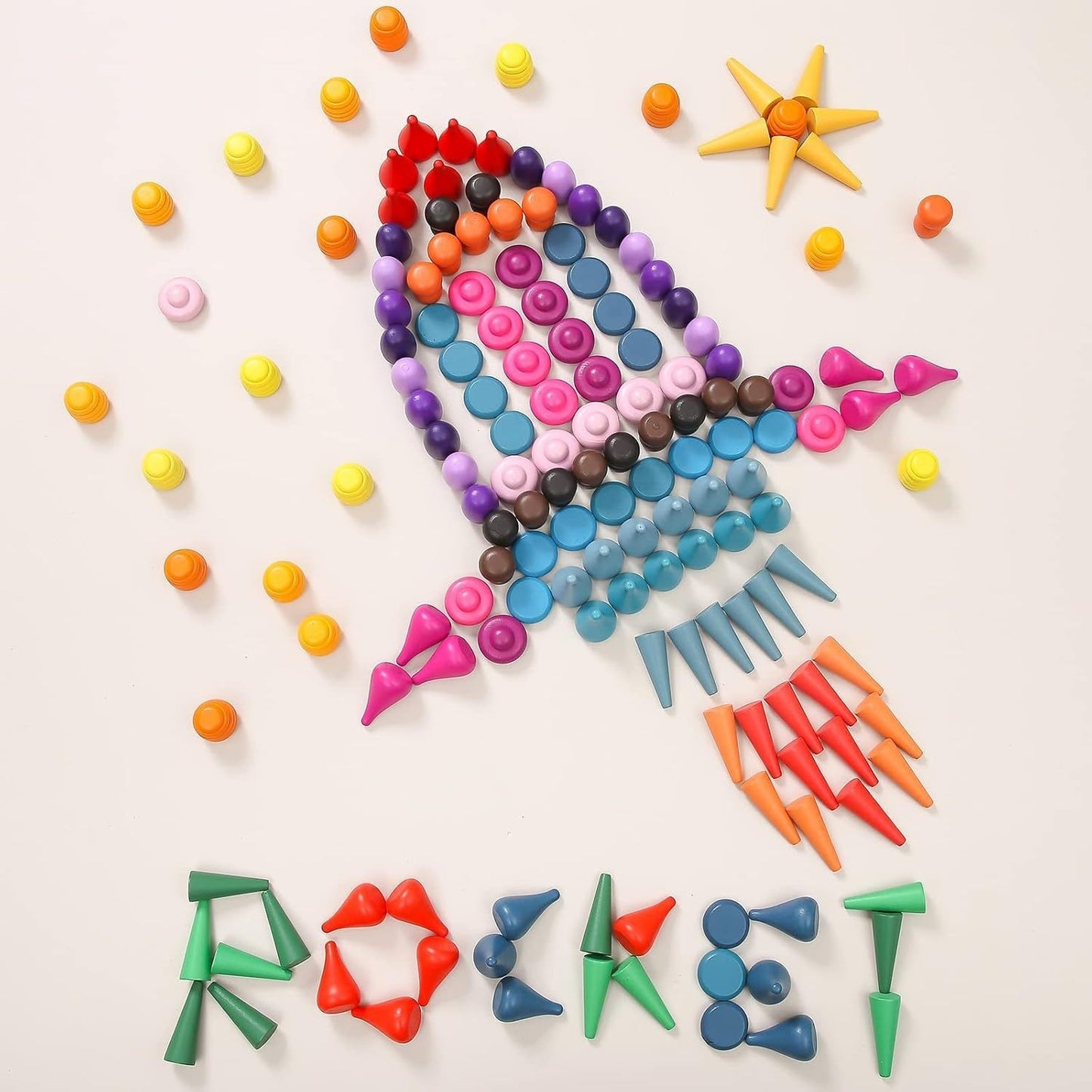 Colorful clay art of a fish with various clay pieces on a light background