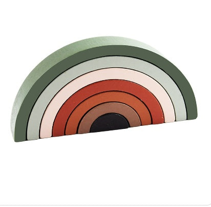 Colorful rainbow-shaped object on a white background